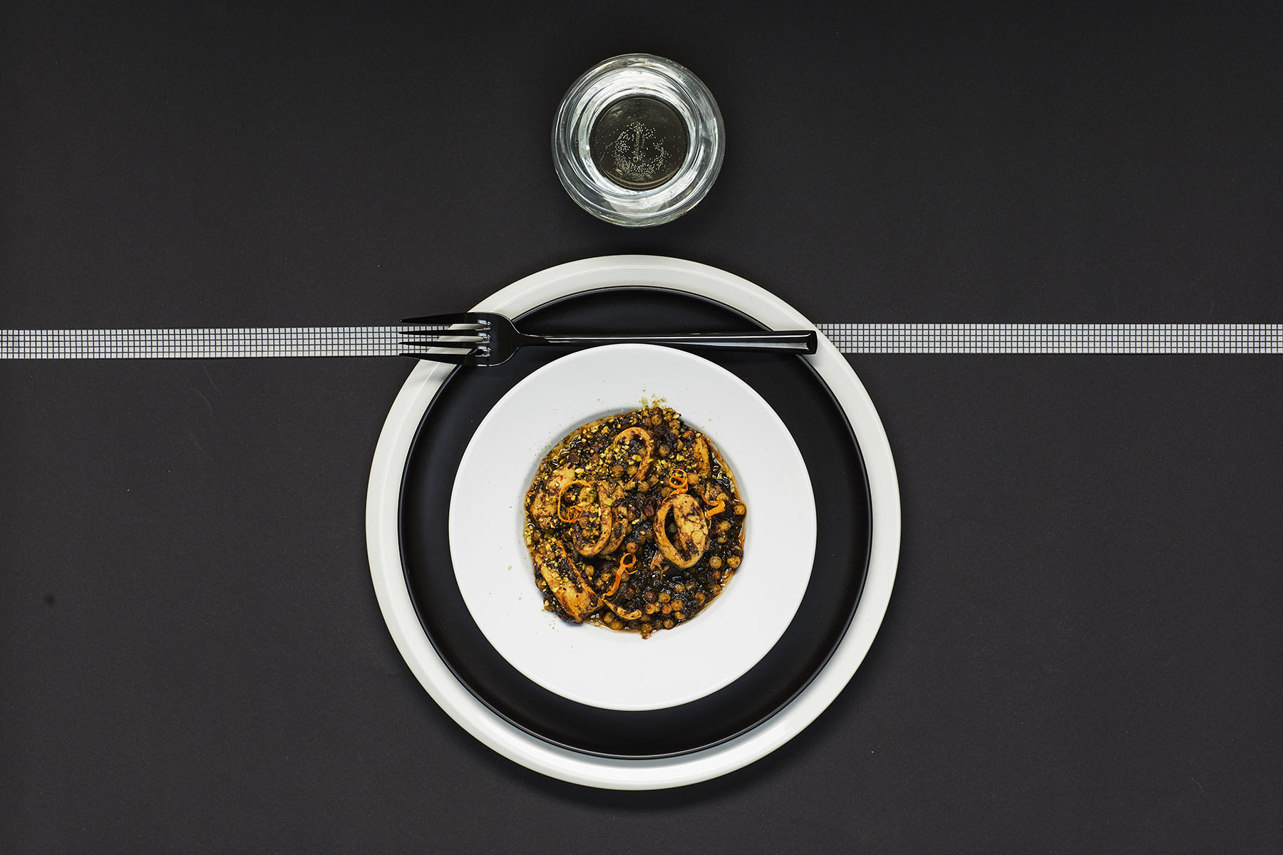Fregola sarda met inktvis en pistache