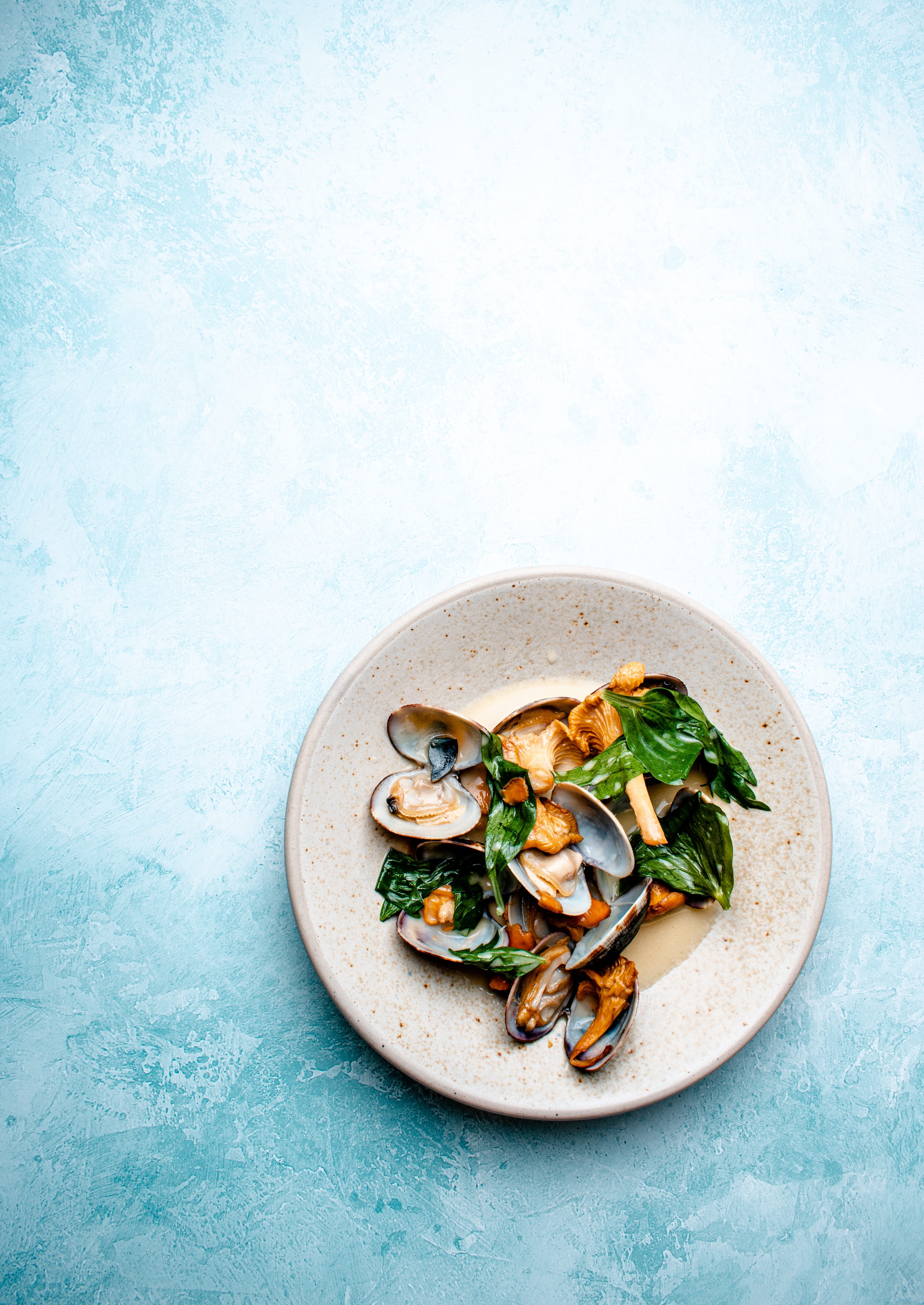 Vongole met oesterzwammen, spinazie en room