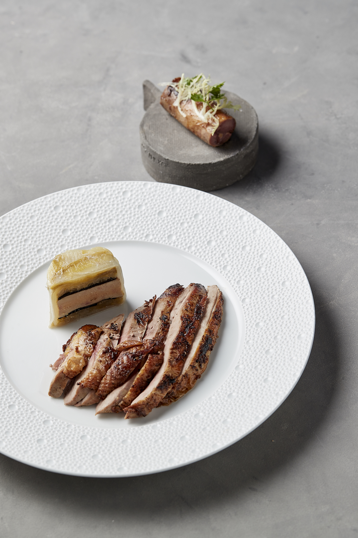 Fazant met pièce montée van witloof, ganzenlever & zwarte truffel