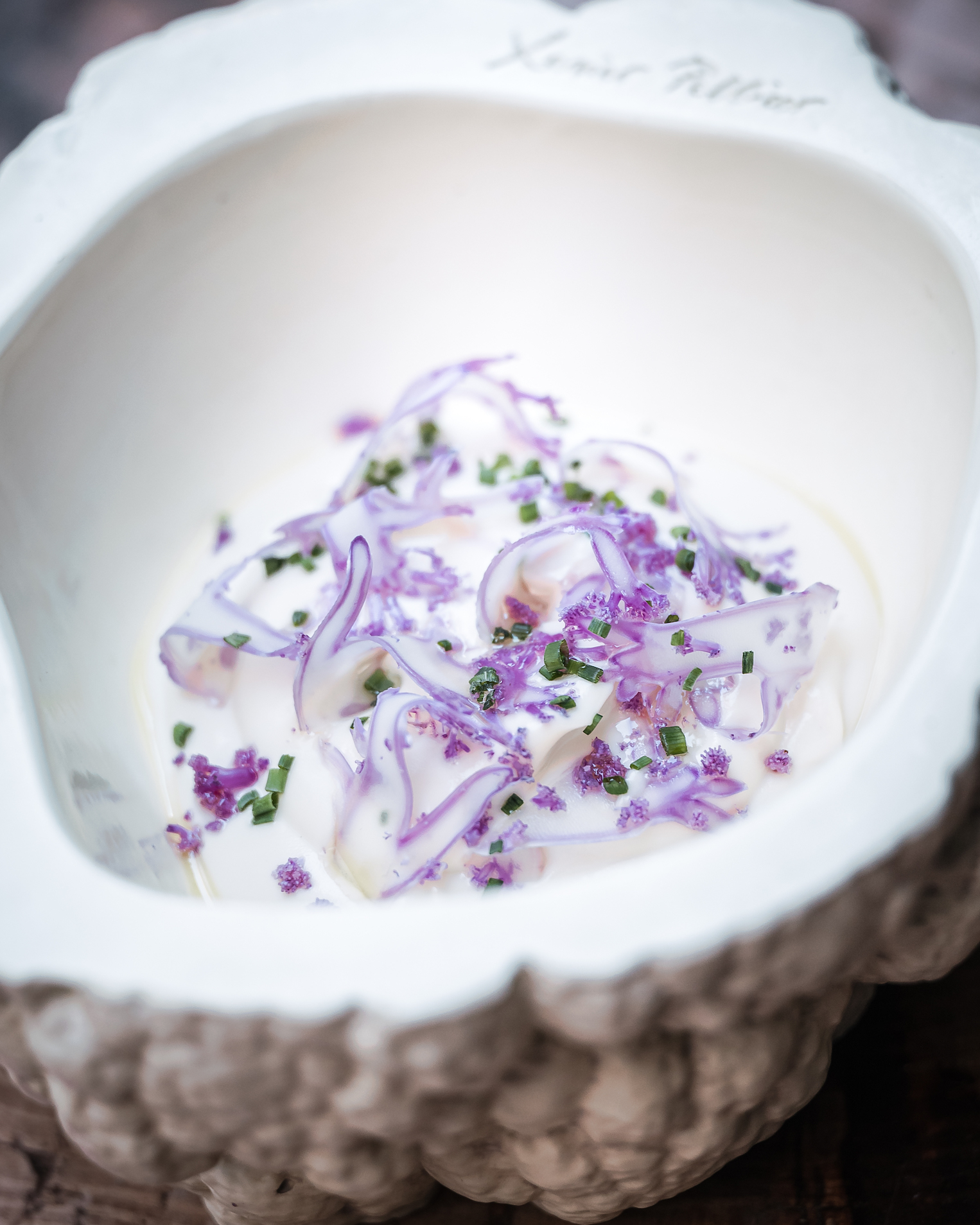 Witte carpaccio met bloemkoolcrème en arganolie