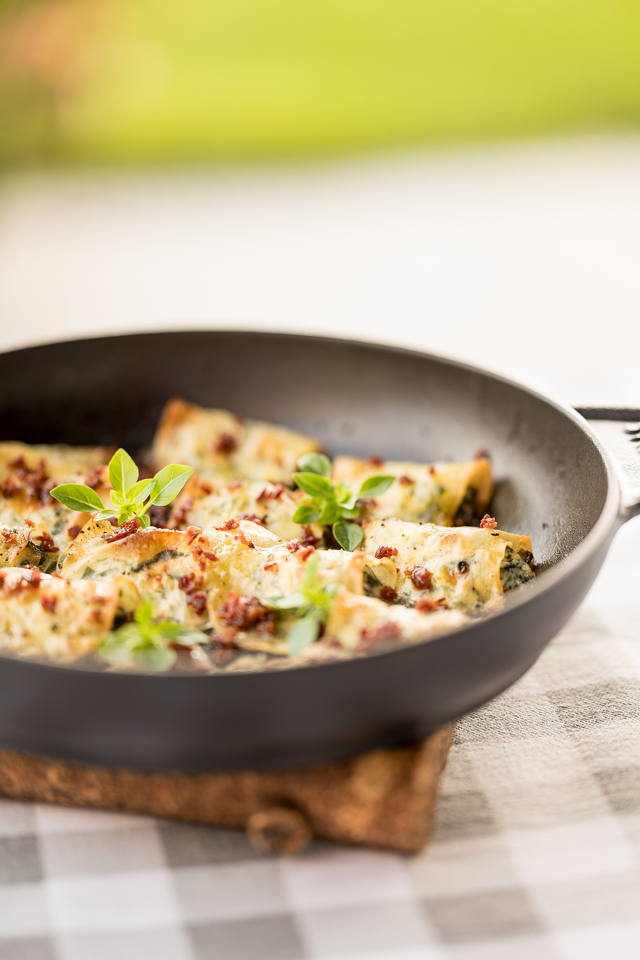 Krokante exquisaravioli's met spinazie, ricotta en hampoeder