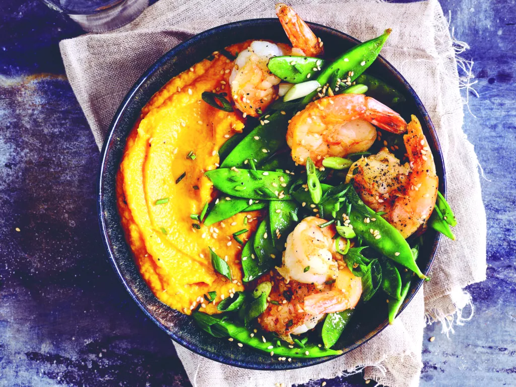 Scampi met wortel-gemberpuree en sluimererwten