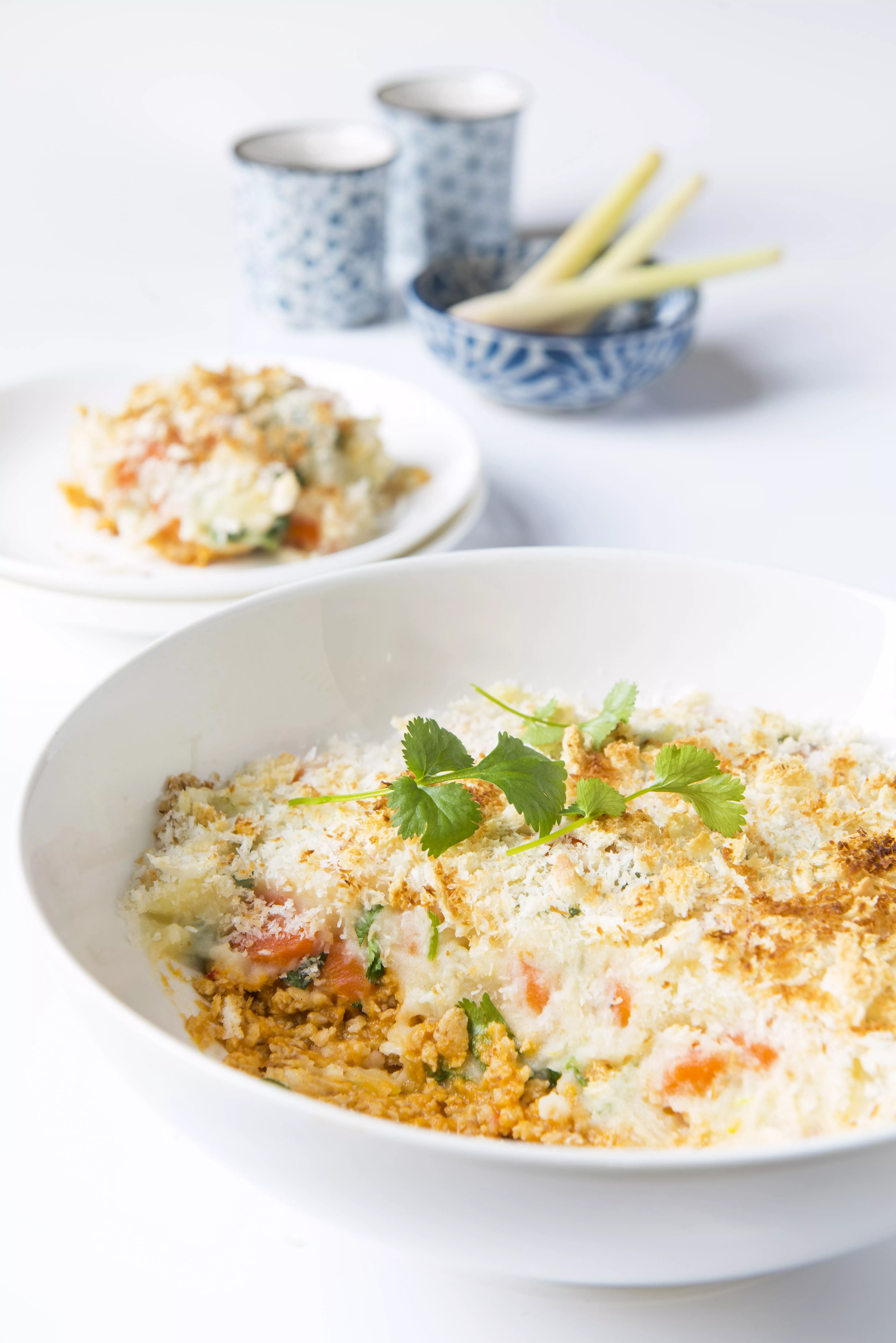 Gegratineerde Thaise schotel met kippengehakt en Légumaise
